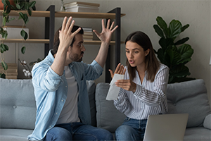 Two Students Discussing over loan and debt