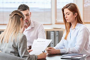 Couple and attorney talking about divorce